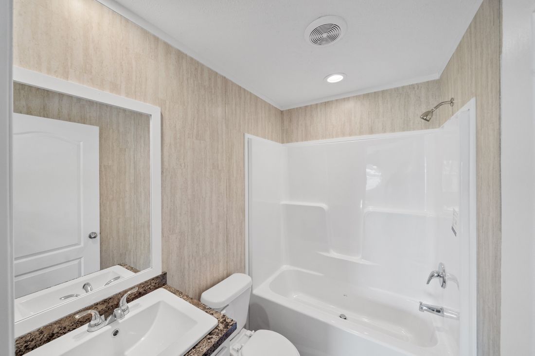 The ZIRCON Guest Bathroom. This Manufactured Mobile Home features 3 bedrooms and 2 baths.