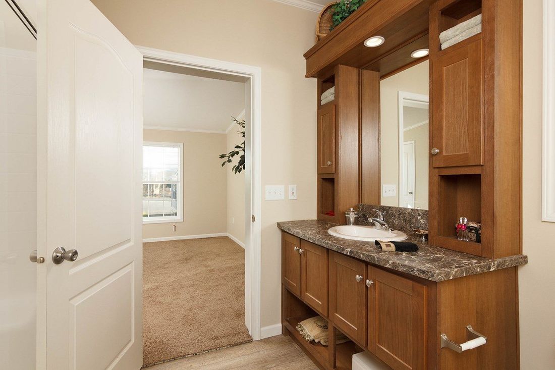 The TRUMAN 5628-68 Primary Bathroom. This Manufactured Mobile Home features 3 bedrooms and 2 baths.