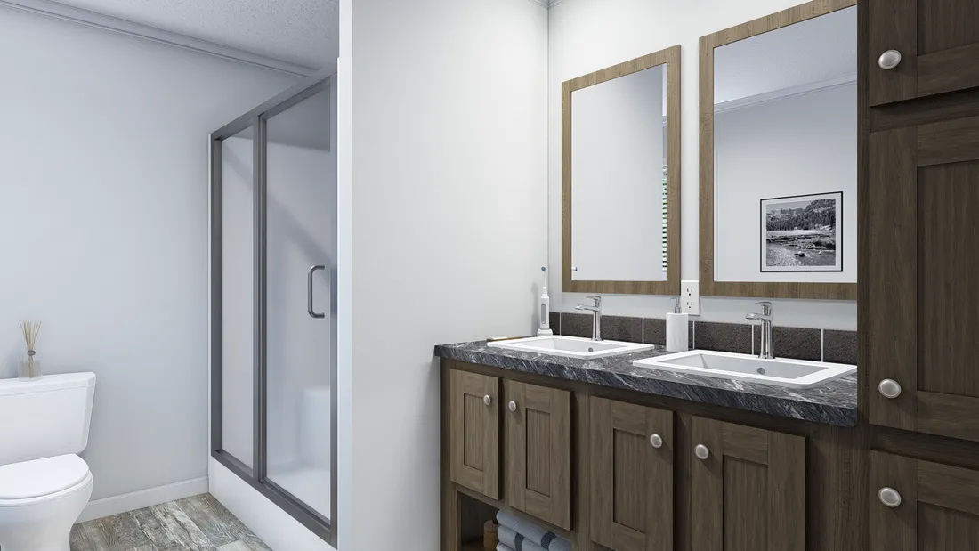The SPRINGFIELD 4428-1855 Primary Bathroom. This Manufactured Mobile Home features 3 bedrooms and 2 baths.